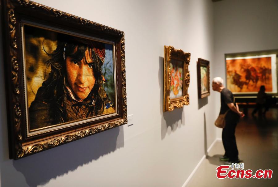 Photo taken on May 16, 2019 shows an exhibition of intangible cultural heritages from Asia at the National Library of China in Beijing as part of the ongoing Conference on Dialogue of Asian Civilizations. More than 60 craftsmen from 13 Asian countries and regions are displaying traditional works such as puppets from Sri Lanka, Persian carpets from Iran and costumes from the Philippines. (Photo: China News Service/Du Yang)