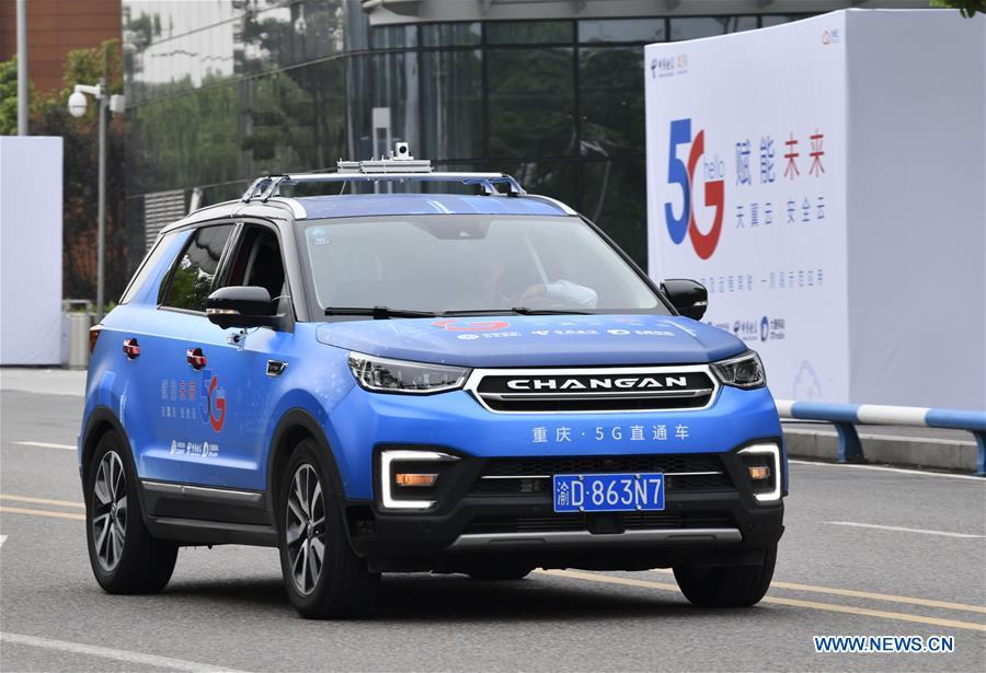A car is controlled by a remote operator during a test run in Chongqing, southwest China, May 15, 2019. A remote-controlled car powered by the 5G network completed a test run on Wednesday in Chongqing. During the test run, a remote operator was able to control the car while watching the live feed of road conditions supported by the 5G network. (Xinhua/Liu Chan)