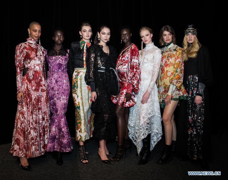 Models pose for a photograph backstage ahead of the Leo & Lin show during Fashion Week Australia in Sydney, Australia, May 15, 2019. (Xinhua/Zhu Hongye)