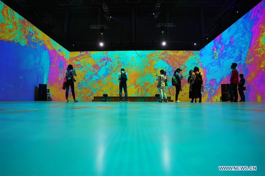 Visitors view an art work during the Asian Digital Art Exhibition held in Beijing, capital of China, May 16, 2019. The exhibition, part of the cultural activities of the Conference on Dialogue of Asian Civilizations, kicked off on Thursday. Works of 30 artists from 12 countries and regions are on show during the exhibition. (Xinhua/Ju Huanzong)