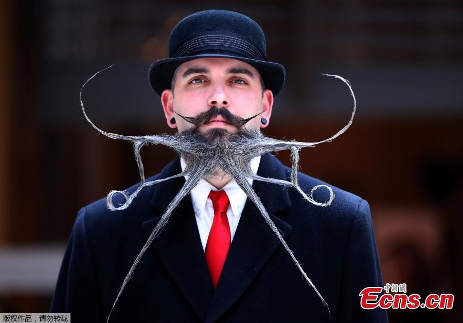 A participant of the international World Beard and Moustache Championships poses before taking part in one of the 17 categories of beard and moustache styles competing in Antwerp, Belgium May 18, 2019. (Photo/Agencies)
