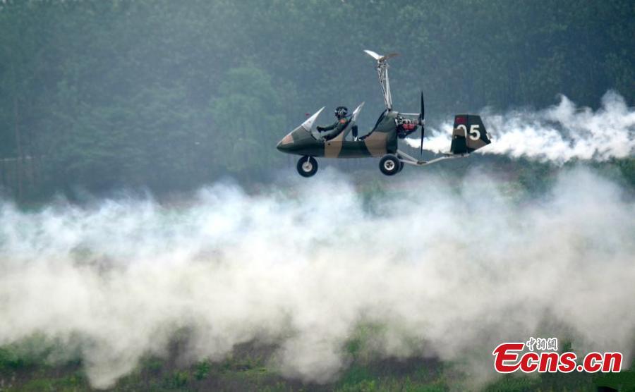 The 2019 World Fly-in Expo (WFE) featuring 560 aircrafts opened on May 18, 2019 in Wuhan, capital of central China\'s Hubei Province. The WFE, which runs until Wednesday, is hosted by the World Air Sports Federation. The Expo features aerial flight performance, aerial sports events, static exhibition and conference forum.The four-day event has attracted 560 aircrafts, with about 100 taking part in the exhibition, according to the organizers.(Photo: China News Service/Zhao Guangliang)