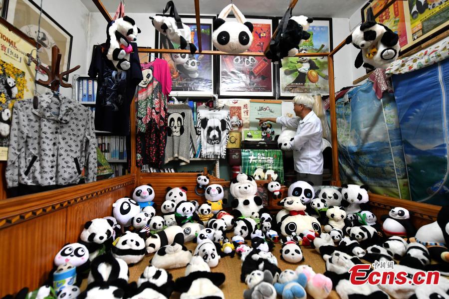 Collector Li Zhiqi shows his collection of giant panda-themed items in Fuzhou City, Fujian Province, May 21, 2019. Li has amassed a trove of nearly 10,000 items featuring the iconic bear, including stamps, dolls, bookmarks, and mugs. (Photo: China News Service/Lyu Ming)
