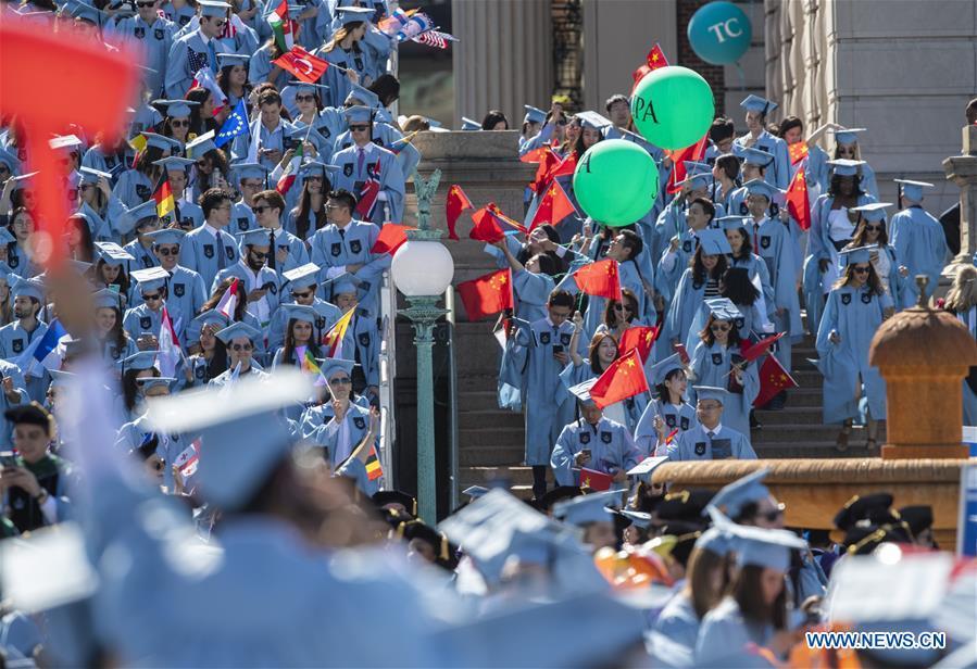 Graduate students enter the venue before the Columbia University Commencement ceremony in New York, the United States, May 22, 2019. The Columbia University Commencement ceremony of the 265th academic year took place on Wednesday. More than 17,000 students from Columbia\'s 18 schools and affiliates graduated this year. (Xinhua/Wang Ying)