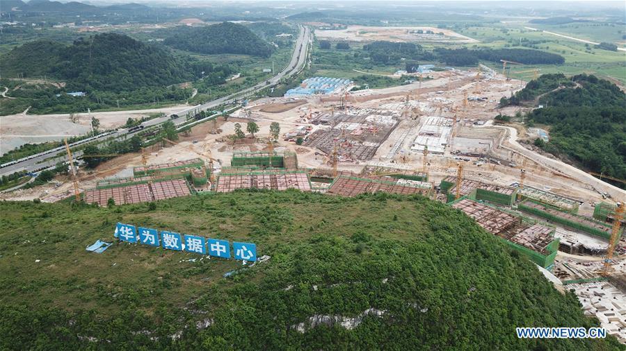 Aerial photo taken on May 19, 2019 shows the construction site of a Huawei Cloud data center in Gui\'an New Area of southwest China\'s Guizhou Province. In Guizhou Province, which hosts China\'s first state-level big data pilot zone, the integration of big data with sectors such as real economy, social management, civil service and rural revitalization has brought significant changes to people\'s life. According to statistics, Guizhou has more than 9,500 big data enterprises and many of them are active players on the global business stage. A 2019 whitepaper published by the China Academy of Information and Communications Technology indicates that Guizhou is taking advantage of big data in the course of its development, as both the growth of the province\'s digital economy and the growth of its employment in digital economy have ranked first in China. (Xinhua/Ou Dongqu)