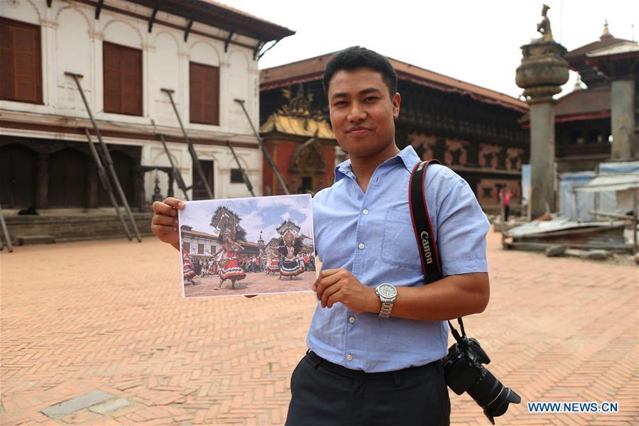 Binaya Hada shows his photographic work \