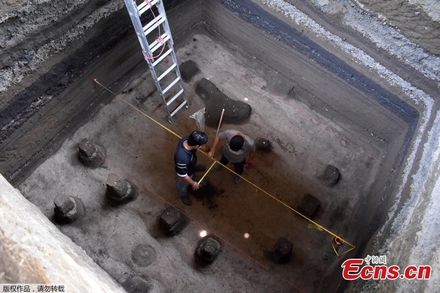 Salvadoran archaeologist work at the Joya de Ceren archaeological site in San Juan Opico, 35 km west of San Salvador, El Salvador, on May 23, 2019. Archaelogical excavations are conducted at Joya de Ceren archaeological site in search of clues on the life, crops and structures of this legendary Mayan town known as the \