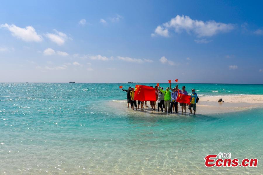 The photo shows the beach of Quanfu Island offering clean sand and water. Being one of the three islands of Xisha islands that opens to tourists, Quanfu island is an uninhabited island which covers an area of 0.02 square kilometers. (Photo: China News Service/ Luo Yunfei)