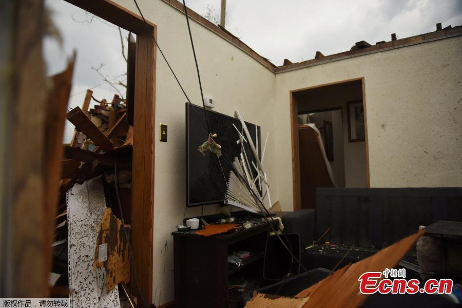 A damaged home on the corner of Woodlawn Avenue following a tornado touchdown overnight in Jefferson City, Missouri, U.S. May 23, 2019.   (Photo/Agencies)