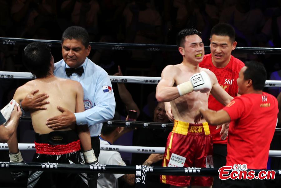 Chinese boxer Xu Can succeeded in defending his World Boxing Association (WBA) featherweight title after defeating challenger Shun Kubo of Japan by technical knockout (TKO) at Xu\'s hometown here on Sunday. The 25-year-old Xu Can took control of the game at the very beginning with steady moves and sharp strikes. In the fifth round, Shun Kubo was knocked down. With cheering audience, Xu Can claimed the victory by TKO in the sixth round.Xu became China\'s youngest world professional boxing champion this January, winning with scores of 117-111, 116-112 and 118-110 over Rojas. After that he was awarded as the first Chinese \