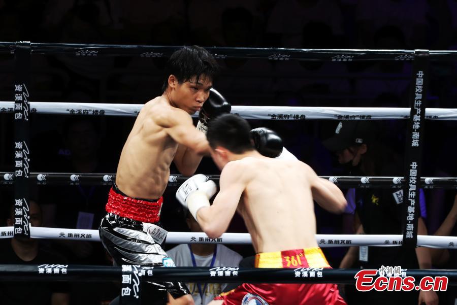 Chinese boxer Xu Can succeeded in defending his World Boxing Association (WBA) featherweight title after defeating challenger Shun Kubo of Japan by technical knockout (TKO) at Xu\'s hometown here on Sunday. The 25-year-old Xu Can took control of the game at the very beginning with steady moves and sharp strikes. In the fifth round, Shun Kubo was knocked down. With cheering audience, Xu Can claimed the victory by TKO in the sixth round.Xu became China\'s youngest world professional boxing champion this January, winning with scores of 117-111, 116-112 and 118-110 over Rojas. After that he was awarded as the first Chinese \