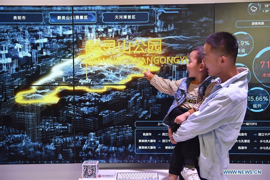 Visitors are seen during China International Big Data Industry Expo 2019 in Guiyang, southwest China\'s Guizhou Province, May 26, 2019. The expo on big data opened Sunday in Guizhou Province, focusing on the latest innovation of the technology and its applications. The four-day expo will be attended by 448 enterprises from 59 countries and regions, according to the organizing committee. (Xinhua/Ou Dongqu)