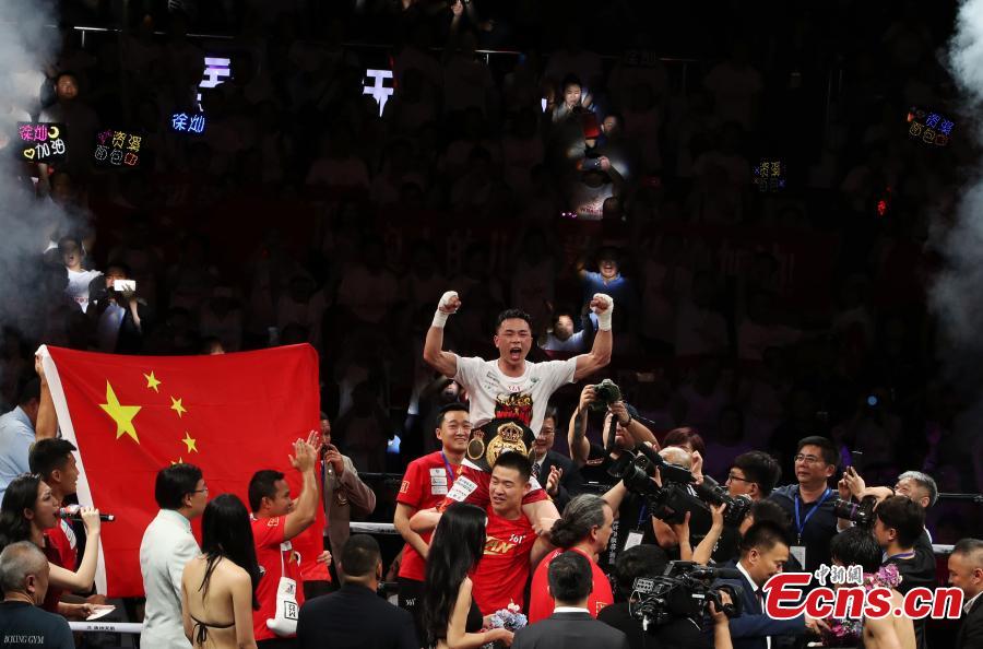 Chinese boxer Xu Can succeeded in defending his World Boxing Association (WBA) featherweight title after defeating challenger Shun Kubo of Japan by technical knockout (TKO) at Xu\'s hometown here on Sunday. The 25-year-old Xu Can took control of the game at the very beginning with steady moves and sharp strikes. In the fifth round, Shun Kubo was knocked down. With cheering audience, Xu Can claimed the victory by TKO in the sixth round.Xu became China\'s youngest world professional boxing champion this January, winning with scores of 117-111, 116-112 and 118-110 over Rojas. After that he was awarded as the first Chinese \