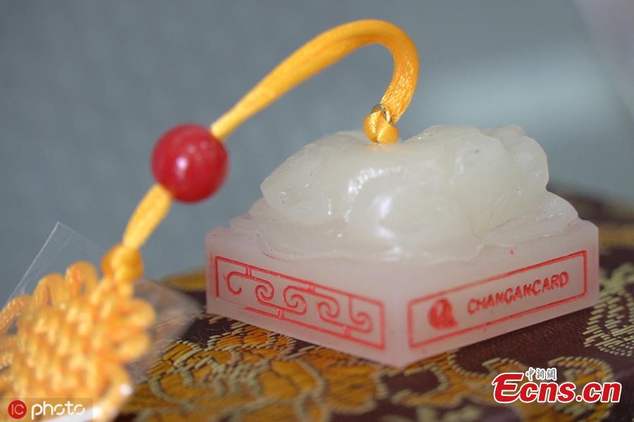 A public transport card in the shape of imperial jade seal is seen in Xi’an City, Shaanxi Province. A joint creation by Chang\'An Card, the provider of the Xi’an public transport card, and the Shaanxi History Museum, the card can be used for public transportation on buses and subways in more than 200 cities.  The design was inspired by the jade seal of an empress in the Western Han Dynasty (206BC - 24AD) unearthed in 1968 just 1 kilometer from Changling, the mausoleum of Emperor Gaozu, Liu Bang, and his wife Lyu Zhi. One of the most important seals ever found, it is made of Hotan jade from Xinjiang Uygur Autonomous Region and is inscribed with the four characters \