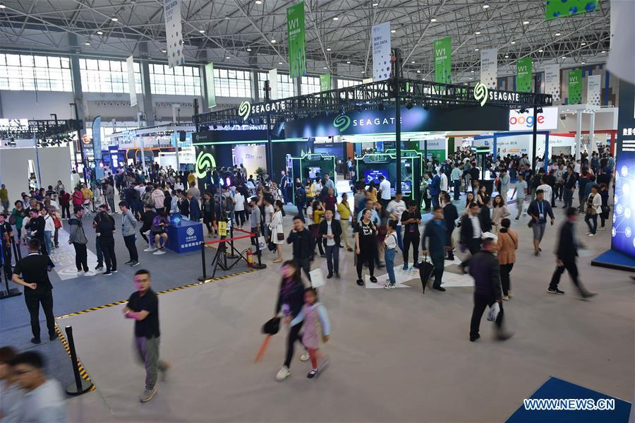 Visitors are seen during China International Big Data Industry Expo 2019 in Guiyang, southwest China\'s Guizhou Province, May 26, 2019. The expo on big data opened Sunday in Guizhou Province, focusing on the latest innovation of the technology and its applications. The four-day expo will be attended by 448 enterprises from 59 countries and regions, according to the organizing committee. (Xinhua/Ou Dongqu)