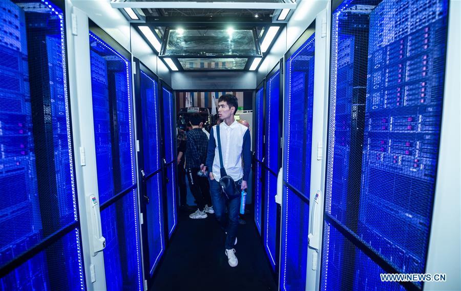 Visitors are seen during China International Big Data Industry Expo 2019 in Guiyang, southwest China\'s Guizhou Province, May 26, 2019. The expo on big data opened Sunday in Guizhou Province, focusing on the latest innovation of the technology and its applications. The four-day expo will be attended by 448 enterprises from 59 countries and regions, according to the organizing committee. (Xinhua/Tao Liang)