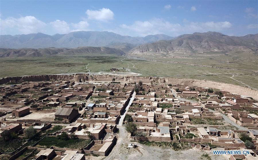 Aerial photo taken on May 28, 2019 shows a view of the Yongtai ancient city in Jingtai County of Baiyin, northwest China\'s Gansu Province. Construction of the Yongtai ancient city began in the early 17th century and the complex used to be a military fortress. Girdled by 12-meter wall structures totaling 1.7 kilometers in length, the Yongtai ancient city looks like a turtle when seen from above and is thus dubbed \