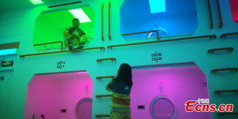 Visitors inside a Mars simulation base in the barren, windswept hills of Jinchang City, Northwest China’s Gansu Province, May 29, 2019. Planned to cover 67 square kilometers, Mars Base 1 Camp will include nine modules including a greenhouse and a mock decompression chamber. Authorities hope the camp will boost tourism and allow visitors to feel as though they are on the Red Planet.  (Photo: China News Service/Wei Jianjun)