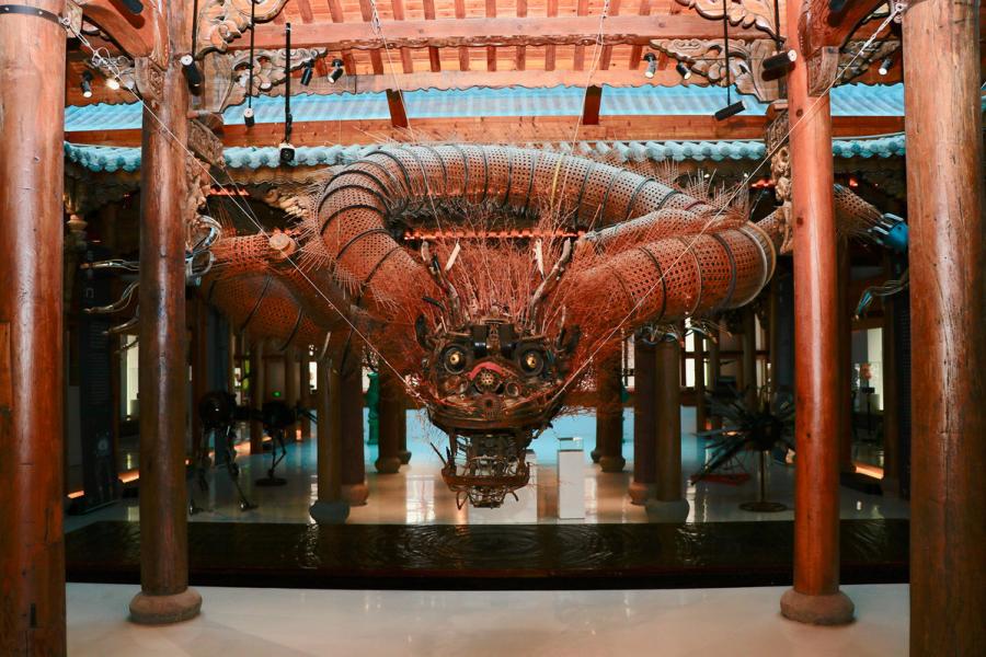 A handicraft in a renovated ancient building in the Bengbu Ancient Residence Exhibition Park, based in Bengbu city of East China\'s Anhui province on May 28, 2019. （By Zhu Lixin/chinadaily.com.cn）

Ancient buildings are brought back to life at a park in Bengbu in East China\'s Anhui province.

More than 100 skilled craftsmen are busy repairing ancient buildings at the Bengbu Ancient Residence Exhibition Park. Hundreds of buildings, mostly traditional residences, have been collected from across China and relocated to the park. Around 450 have been repaired and rebuilt on their new sites on an island at the park\'s Longzi Lake.

The park is still under construction and is expected to cover more than 330 hectares upon completion — one of the country\'s largest spots for ancient residences.