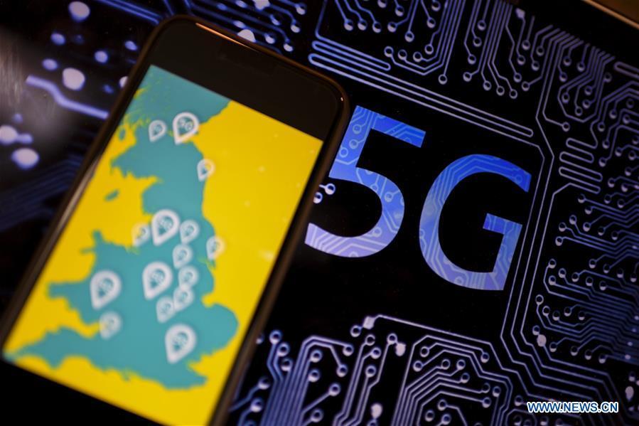 Photo taken on May 30, 2019 shows the logo of 5G network in London, Britain. Mobile network operator EE said on last Wednesday that it would launch Britain\'s first 5G service in six major cities on May 30th. (Xinhua/Han Yan)