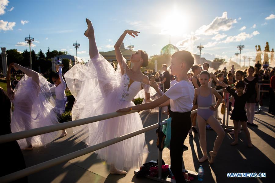 Dancers take part in a ballet master class by Nikolay Tsiskaridze during The World Ballet Holidays Festival in Moscow, Russia, on June 1, 2019. The World Ballet Holidays Festival is held from May 31 to June 2 at VDNH exhibition complex in Moscow. One of the highlights of the festival is an outdoor ballet class conducted by ballet dancer Nikolay Tsiskaridze. (Xinhua/Maxim Chernavsky)