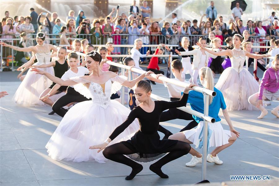 Dancers take part in a ballet master class by Nicolay Tsiskaridze during the World Ballet Holidays Festival in Moscow, Russia, on June 1, 2019. The World Ballet Holidays Festival is held from May 31 to June 2 at VDNH exhibition complex in Moscow. One of the highlights of the festival is an outdoor ballet class conducted by ballet dancer Nikolay Tsiskaridze. (Xinhua/Maxim Chernavsky)