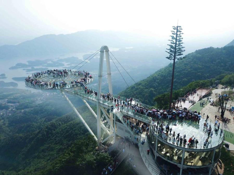 Tourists walk on the \