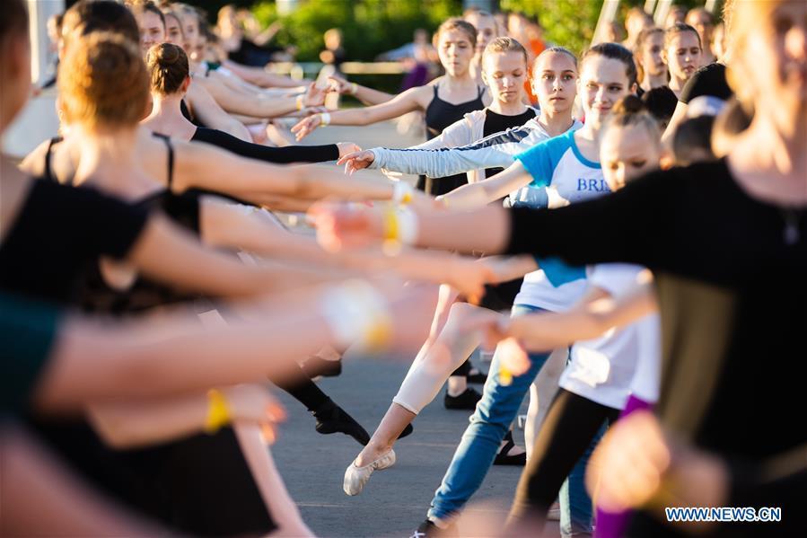 Dancers take part in a ballet master class by Nikolay Tsiskaridze during The World Ballet Holidays Festival in Moscow, Russia, on June 1, 2019. The World Ballet Holidays Festival is held from May 31 to June 2 at VDNH exhibition complex in Moscow. One of the highlights of the festival is an outdoor ballet class conducted by ballet dancer Nikolay Tsiskaridze. (Xinhua/Maxim Chernavsky)