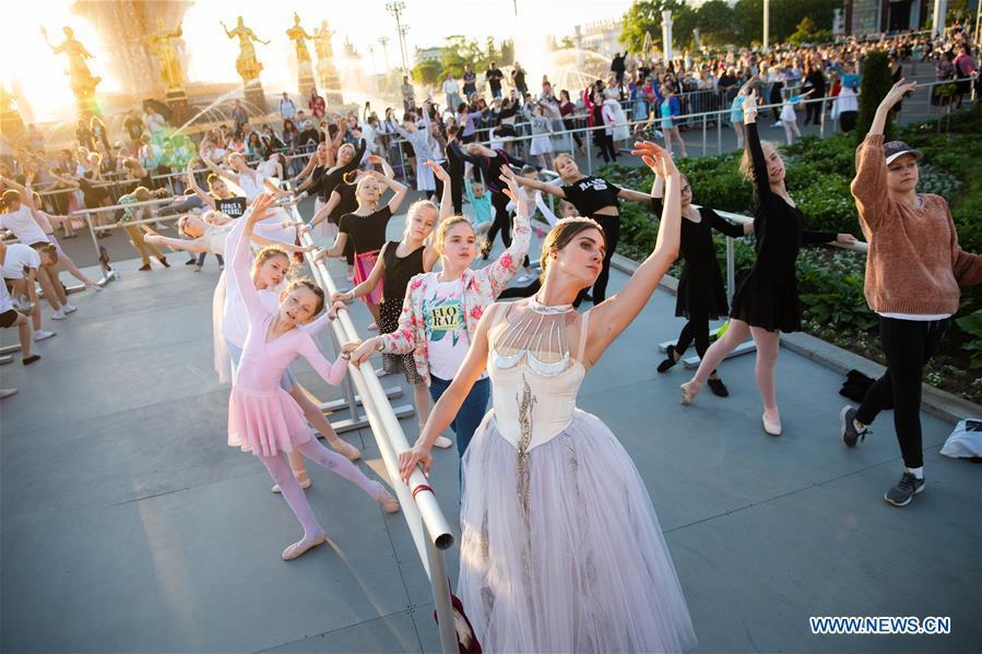 Dancers take part in a ballet master class by Nikolay Tsiskaridze during The World Ballet Holidays Festival in Moscow, Russia, on June 1, 2019. The World Ballet Holidays Festival is held from May 31 to June 2 at VDNH exhibition complex in Moscow. One of the highlights of the festival is an outdoor ballet class conducted by ballet dancer Nikolay Tsiskaridze. (Xinhua/Maxim Chernavsky)