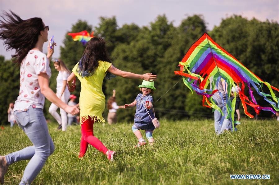 People fly kites during the Motley Sky festival in Moscow, Russia, on May 26, 2019. The Motley Sky festival was held in Moscow from May 25 to 26. (Xinhua/Maxim Chernavsky)