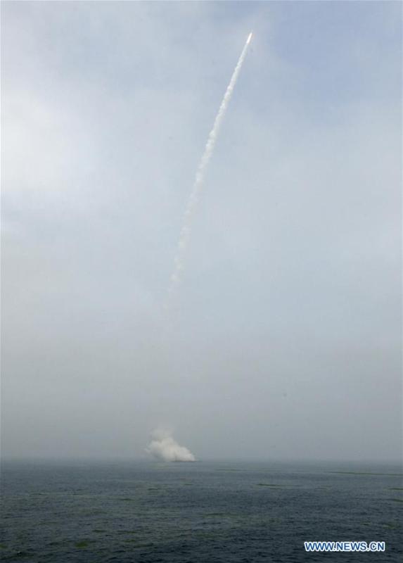 A Long March-11 solid propellant carrier rocket is launched from a mobile launch platform in the Yellow Sea off east China\'s Shangdong Province, June 5, 2019. China successfully launched a rocket from a mobile launch platform in the Yellow Sea off Shandong Province on Wednesday, sending two technology experiment satellites and five commercial satellites into space. A Long March-11 solid propellant carrier rocket blasted off at 12:06 p.m. from the mobile platform. It is China\'s first space launch from a sea-based platform and the 306th mission of the Long March carrier rocket series. (Xinhua/Zhu Zheng)