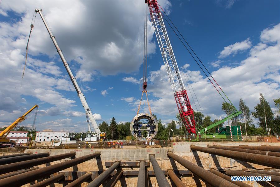 Cranes lift components of Tunnel Boring Machine (TBM) in Moscow, capital of Russia, June 3, 2018. Since August 2017, China Railway Construction Corporation Limited (CRCC) has been building a 4.6-km section and three stations on the \
