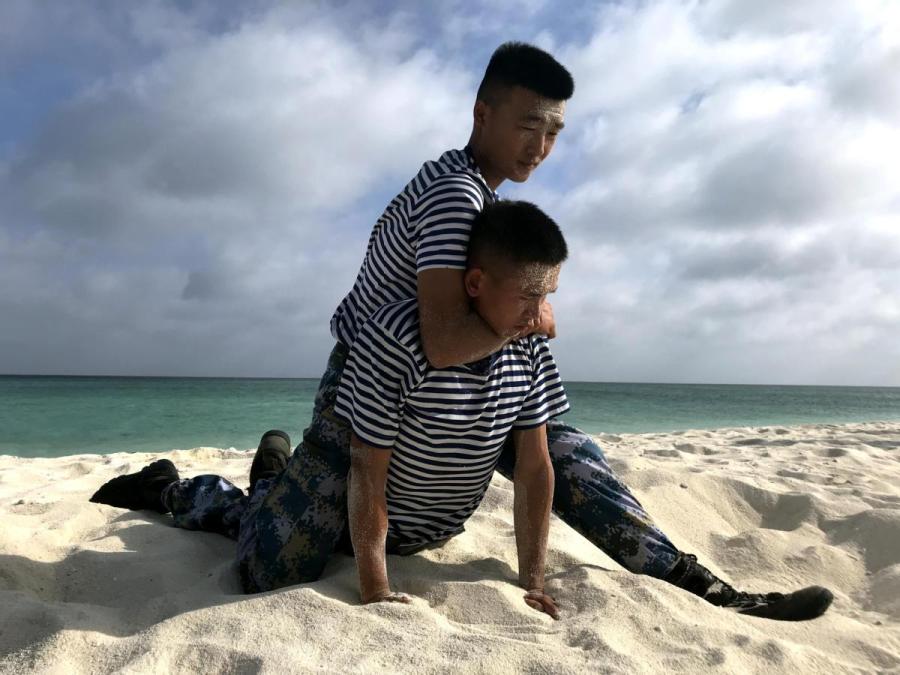 Garrison members undertake physical training. (CAI SHENGQIU/FOR CHINA DAILY)

Water shortage

A shortage of fresh water has also hindered the trees\' growth. In 2008, desalination facilities were installed at the camp, but before then the water for both the trees and daily use came from a well.

\