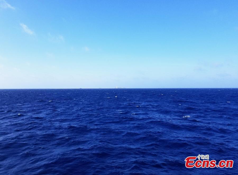 PLA Navy soldiers work on Zhongjian Island of Xisha Islands in South China Sea, Hainan Province. Over dozens of years, soldiers have transformed the barren site into a lush area despite the harsh environment of high temperatures, high humidity, high salt and lack of fresh water. (Photo: China News Service/Wang Xiaobin)