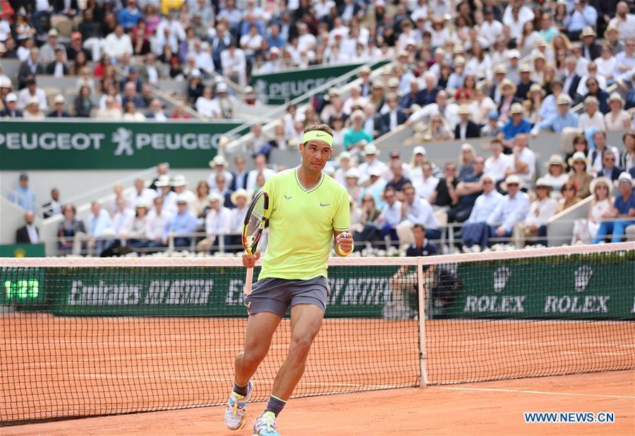 Rafael Nadal of Spain competes during the men\'s singles final with Dominic Thiem of Austria at French Open tennis tournament 2019 at Roland Garros, in Paris, France on June 9, 2019. (Xinhua/Gao Jing)