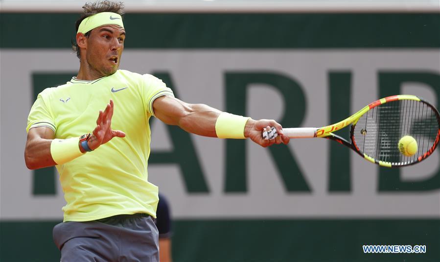Rafael Nadal of Spain competes during the men\'s singles final with Dominic Thiem of Austria at French Open tennis tournament 2019 at Roland Garros, in Paris, France on June 9, 2019. (Xinhua/Han Yan)