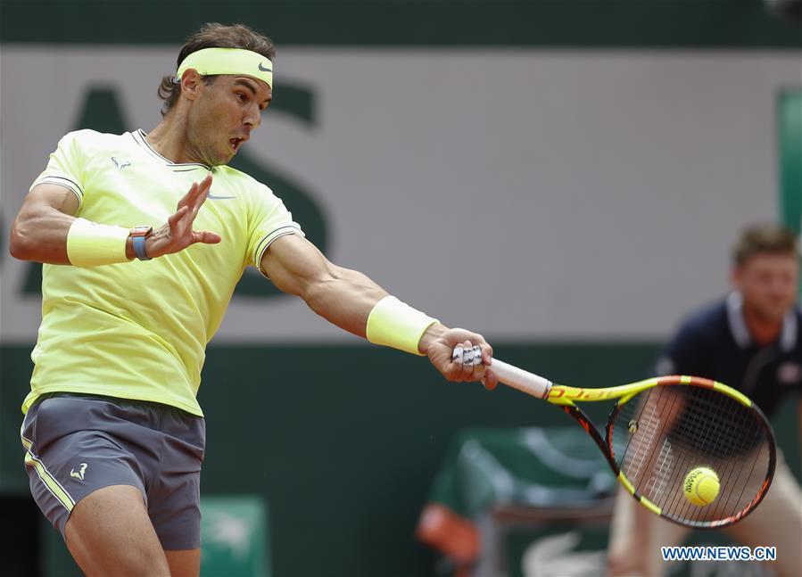 Rafael Nadal of Spain competes during the men\'s singles final with Dominic Thiem of Austria at French Open tennis tournament 2019 at Roland Garros, in Paris, France on June 9, 2019. (Xinhua/Han Yan)