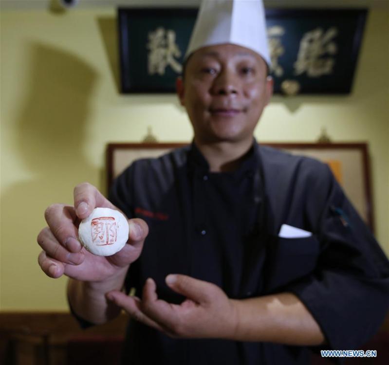 Tian Yong, Executive Chef of Bistro Na\'s, shows Na\'s White Crisp at Bistro Na\'s in Temple City, Los Angeles, the United States, on June 7, 2019. Bistro Na\'s in Los Angeles made headlines this week with the announcement that it had been awarded a coveted Michelin Star by the famed Michelin Restaurant Guide. This special ranking broke Michelin\'s 10-year absence from Los Angeles, and made Bistro Na\'s the only Chinese restaurant in Southern California to be so honored. (Xinhua/Li Ying)
