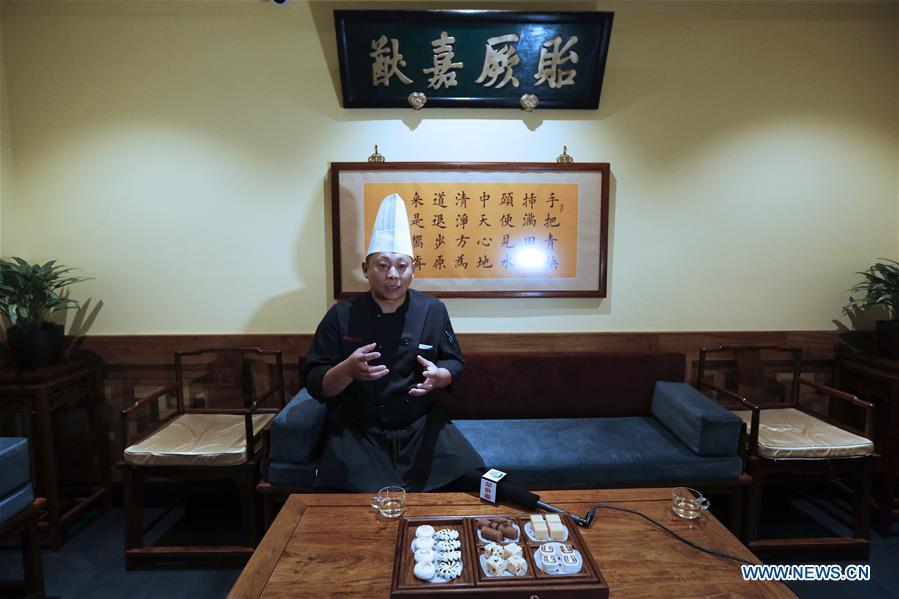 Tian Yong, Executive Chef of Bistro Na\'s, speaks during an interview with Xinhua at Bistro Na\'s in Temple City, Los Angeles, the United States, on June 7, 2019. Bistro Na\'s in Los Angeles made headlines this week with the announcement that it had been awarded a coveted Michelin Star by the famed Michelin Restaurant Guide. This special ranking broke Michelin\'s 10-year absence from Los Angeles, and made Bistro Na\'s the only Chinese restaurant in Southern California to be so honored. (Xinhua/Li Ying)