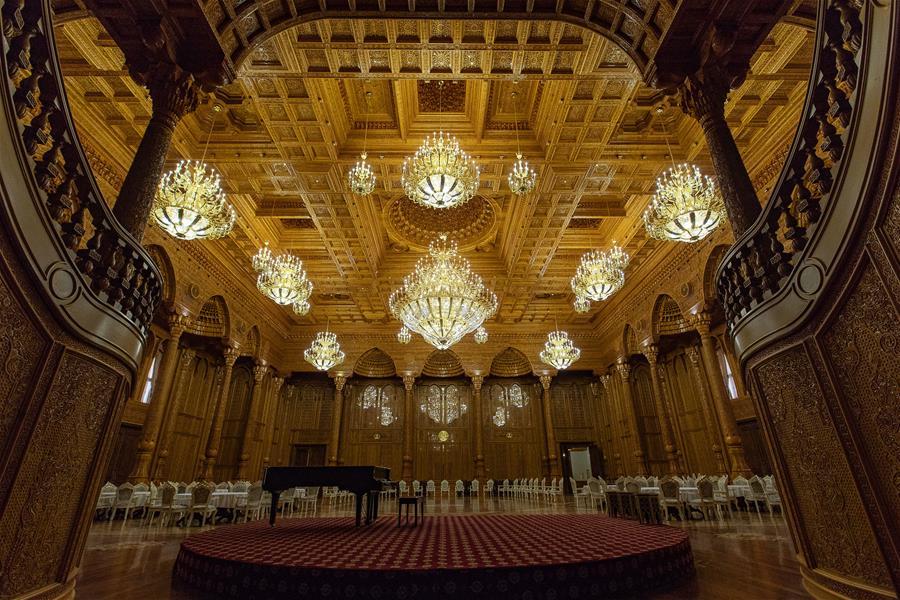 Photo taken on April 14, 2019 shows a banquet hall in the Kohi Navruz (Navruz Palace) in Dushanbe, Tajikistan. The building has 12 halls, each of which is made in a unique style. (Xinhua/Bai Xueqi)