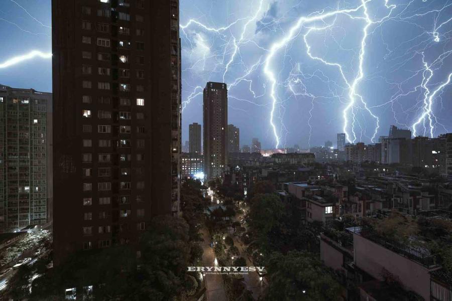 The lightning strike caught by Luo Xing in Chongqing. (Photo provided to chinadaily.com.cn)
Summer is the best season for Luo Xing, a photographer in Southwest China’s Chongqing, who loves shooting lightning.

“I feel so excited when dark clouds gather and strong wind blows,” he said. “It means a thunderstorm is coming.”

Chongqing usually sees many thunderstorms in summer time. Luo has shot many images of lightning over the city landscape.

The business management major learned photography by himself and now he works for Getty Images China on contract.

Surrounded by two rivers and mountains, Chongqing attracts many urban landscape photographers with its unique city view and geography.