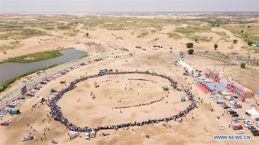 Aerial Photo taken on June 10, 2019 shows the scene a desert Nadam Fair held in Naiman Banner, Tongliao City, north China\'s Inner Mongolia Autonomous Region. (Xinhua/Peng Yuan)