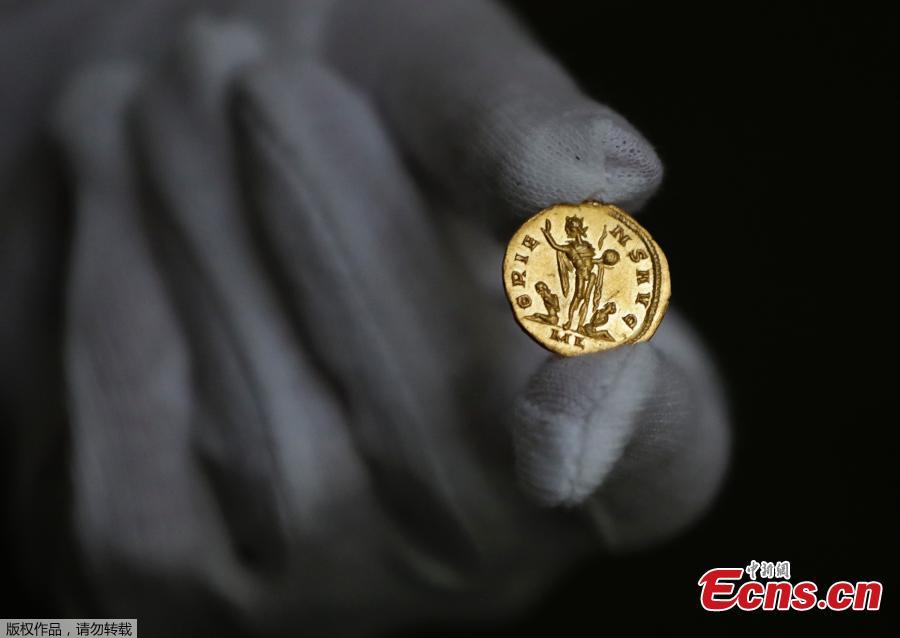 A very rare Roman gold coin dating from AD 293-296, discovered in a newly ploughed field in Kent, sold for 552,000 pounds at an auction held by Dix Noonan Webb, the Mayfair-based international coin, medal, banknote and jewellery specialists on June 6, 2019.  The coin, known as an Aureus - a gold coin of ancient Rome, is relatively small. It is 4.31grams in weight and only a bit bigger than a penny. Dating from the reign of Allectus, it was found near Dover, Kent, adjacent to a Roman road. (Photo/Agencies)