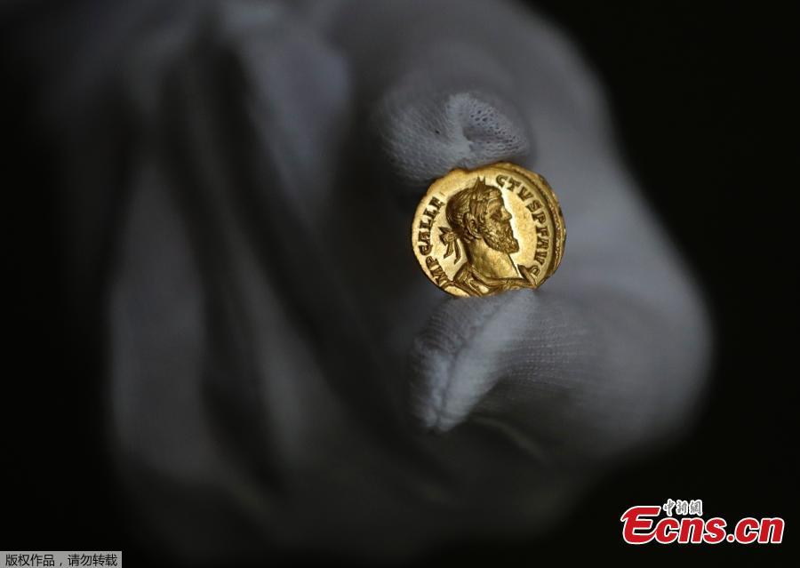 A very rare Roman gold coin dating from AD 293-296, discovered in a newly ploughed field in Kent, sold for 552,000 pounds at an auction held by Dix Noonan Webb, the Mayfair-based international coin, medal, banknote and jewellery specialists on June 6, 2019.  The coin, known as an Aureus - a gold coin of ancient Rome, is relatively small. It is 4.31grams in weight and only a bit bigger than a penny. Dating from the reign of Allectus, it was found near Dover, Kent, adjacent to a Roman road. (Photo/Agencies)