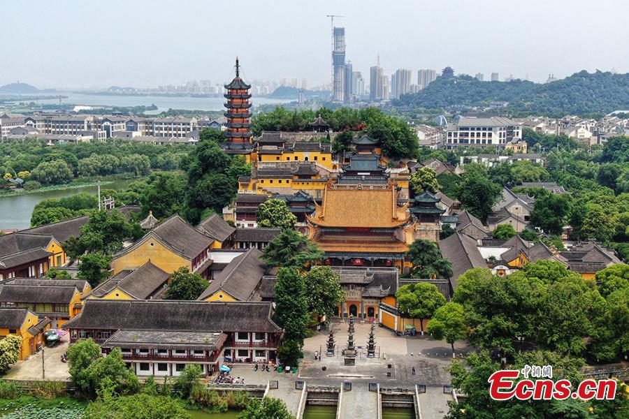 An aerial view of the Jinshan Park in Zhenjiang City, Jiangsu Province, June 11, 2019. The park is home to Jinshan Temple, a famous Buddhist temple built on a mountain to the south of the Yangtze River. (Photo: China News Service/Yang Bo)