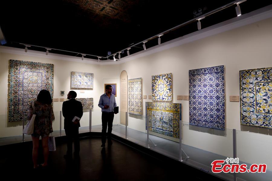An exhibition titled ‘The Land of the Glazed Cities: 500 Years of Azulejo in Portugal’ opens in the Palace of Eternal Longevity (Yongshou gong) at the Palace Museum in Beijing, June 11, 2019. As the first exhibition jointly organized by the Palace Museum and the Museu Nacional do Azulejo, it showcases more than 50 of the most exquisite works of Portuguese azulejo (a form of painted tilework) from the sixteenth to twenty-first centuries. Since each work comprises many individual tiles, the total number of tiles to be displayed is approximately 5,000. (Photo: China News Service/Du Yang)