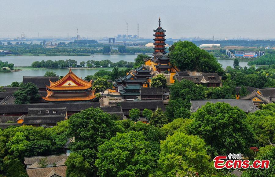 An aerial view of the Jinshan Park in Zhenjiang City, Jiangsu Province, June 11, 2019. The park is home to Jinshan Temple, a famous Buddhist temple built on a mountain to the south of the Yangtze River. (Photo: China News Service/Yang Bo)