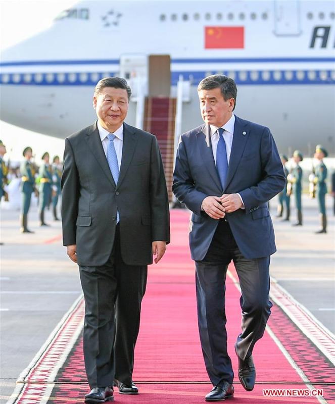 Chinese President Xi Jinping is received by his Kyrgyz counterpart Sooronbay Jeenbekov upon his arrival in Bishkek, Kyrgyzstan, June 12, 2019. Xi arrived here Wednesday for a state visit to Kyrgyzstan and the 19th Shanghai Cooperation Organization (SCO) summit. (Xinhua/Xie Huanchi)