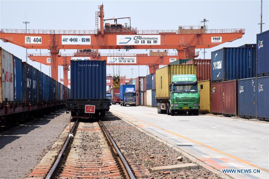 Photo taken on June 12, 2019 shows the containers at the Qingdao multimodal transportation center at a demonstration zone for China-SCO local economic and trade cooperation in Jiaozhou City, east China\'s Shandong Province. (Xinhua/Li Ziheng)