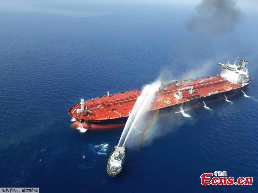 Two oil tankers have been attacked in the Gulf of Oman, leaving one ablaze and both adrift, raising regional tensions a month after a similar incident involving four tankers. The attacks occurred along one of the world’s busiest oil routes, and the price of oil surged as the initial reports emerged on June 13, 2019.(Photo/Agencies)